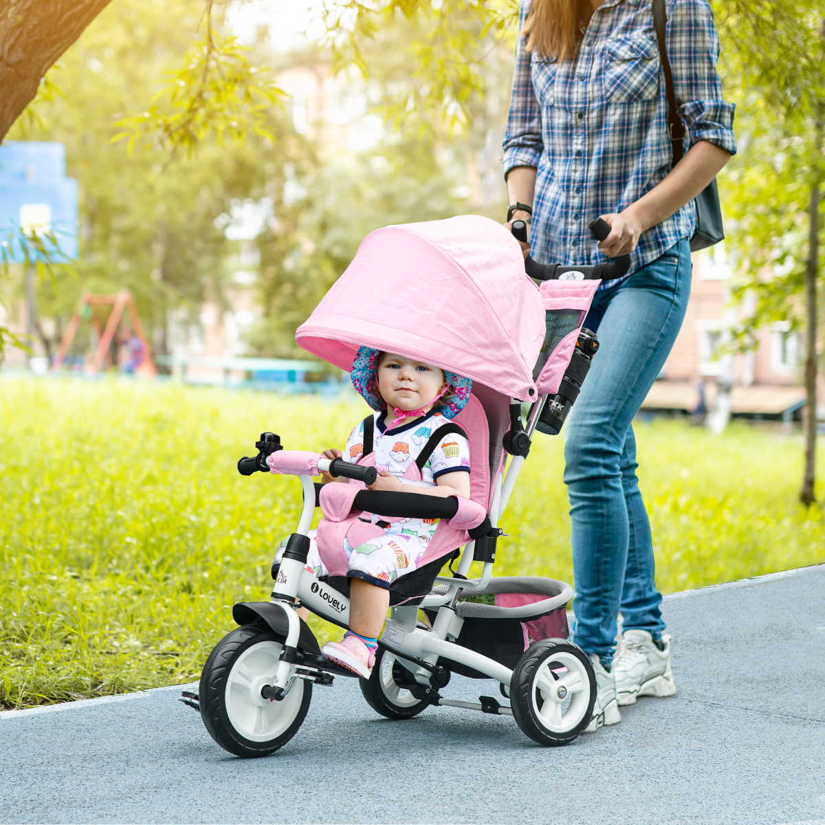Green HOMCOM 6-in-1 kids trike stroller with parent handle, adjustable seat, and safety features for children.