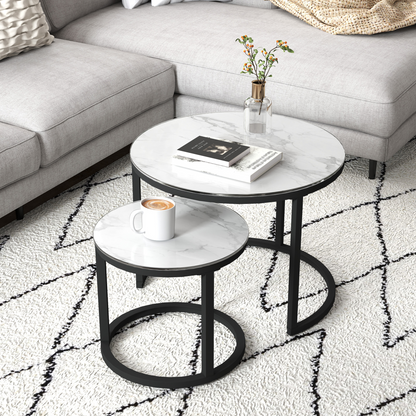 Set of 2 round glass nesting coffee tables by HOMCOM, showcasing sleek transparent tabletops and modern design.