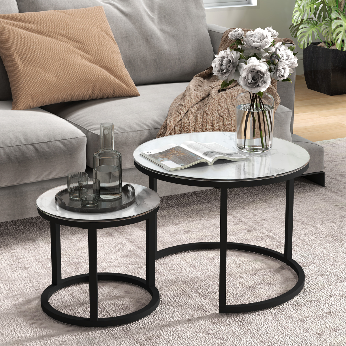 Set of 2 HOMCOM glass coffee nesting tables with round tops and sleek modern design for living room decor.