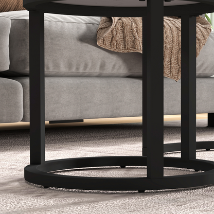 Pair of HOMCOM glass coffee tables, round nesting design with transparent tabletops and sleek metal legs.