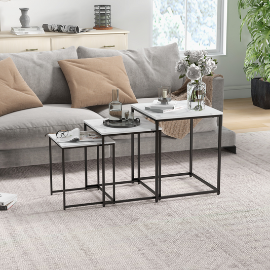 Set of three white HOMCOM nesting coffee tables with sleek, modern design, perfect for living room or small space use.
