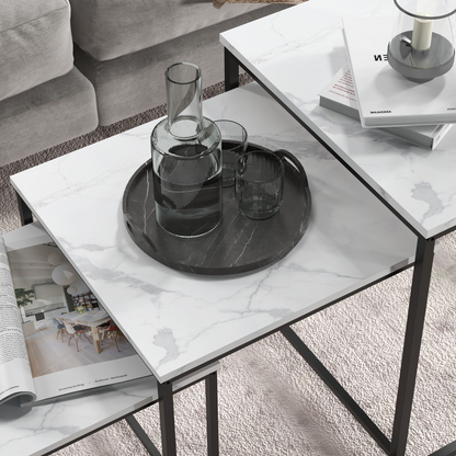 Set of three white nesting coffee tables by HOMCOM, featuring modern design and versatile sizes for living room decor.