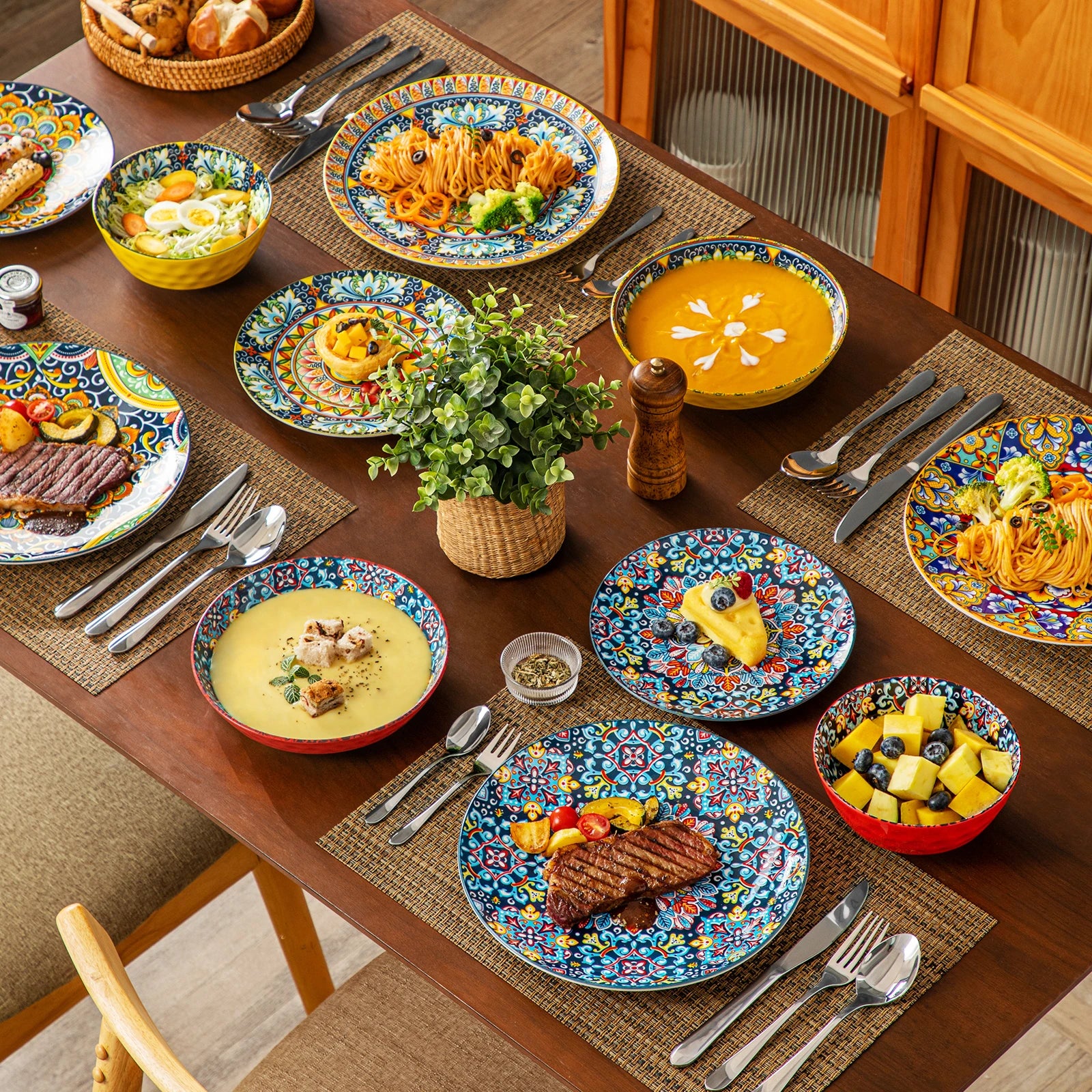Livoshop 24-piece ceramic dinnerware set with bohemian stoneware design including dinner, dessert, cereal, and pasta bowls.