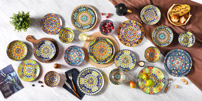 Livoshop 24-piece ceramic dinnerware set with Bohemian style, includes dinner plates, dessert plates, cereal, and pasta bowls.