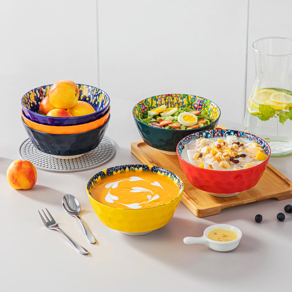 12/16/18/24-piece ceramic dinnerware set by Livoshop, bohemian stoneware with dinner, dessert, cereal, and pasta bowls and plates.