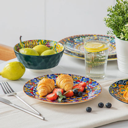 Livoshop 24-piece ceramic dinnerware set with bohemian stoneware design, includes dinner plates, dessert plates, cereal, and pasta bowls.