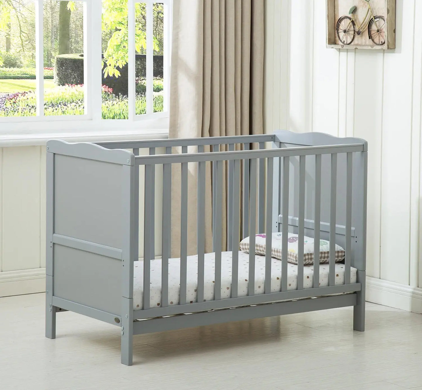 Wooden baby cot bed Orlando by Livoshop with top changer and aloe vera water-repellent mattress in grey, suitable for infants and toddlers.