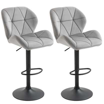 Pair of light grey fabric bar stools with adjustable height and metal bases, perfect for kitchen counters or bars.