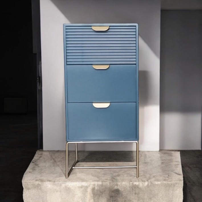 Blue wooden bedside table with three drawers and scalloped design, MSL storage unit for bedroom organization.