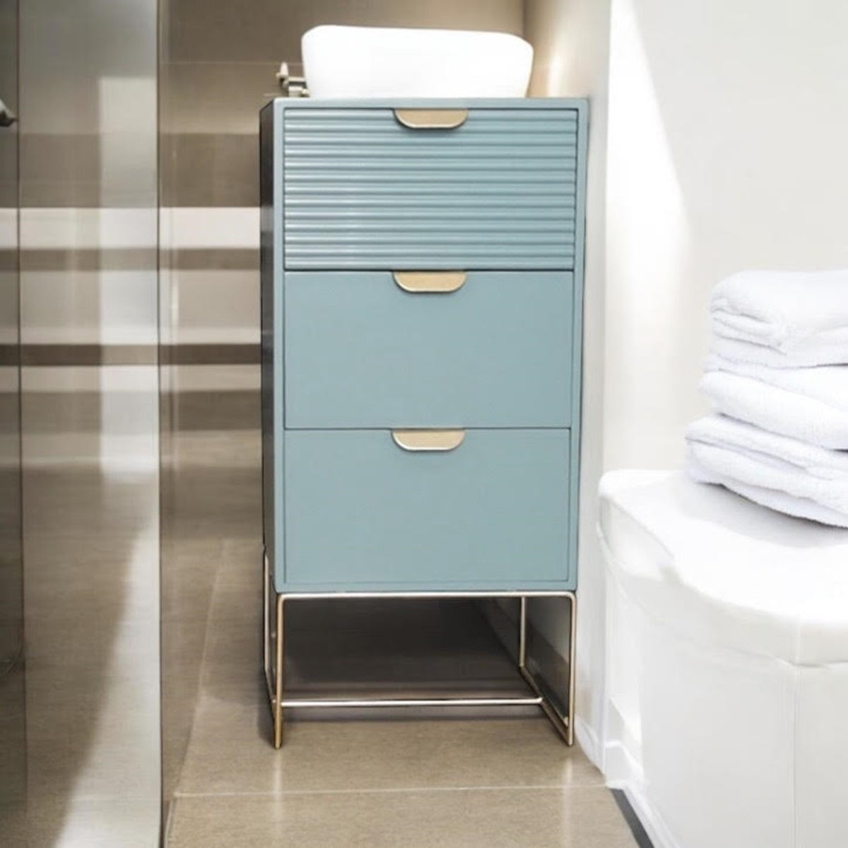 Green wooden bedside table with three drawers and scalloped design, compact storage unit by MSL.