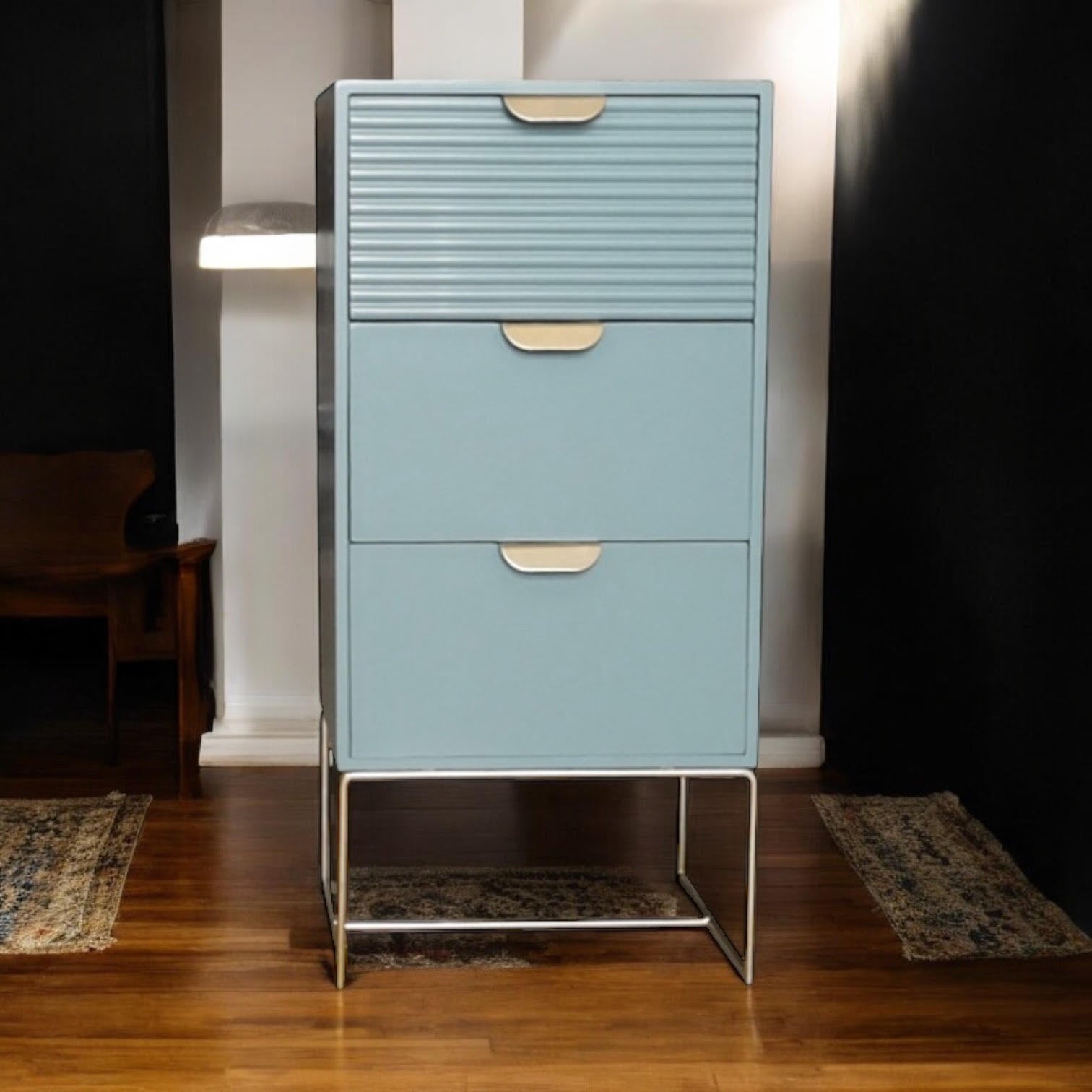 Green wooden bedside table with three drawers and scalloped edges, compact storage unit by MSL.