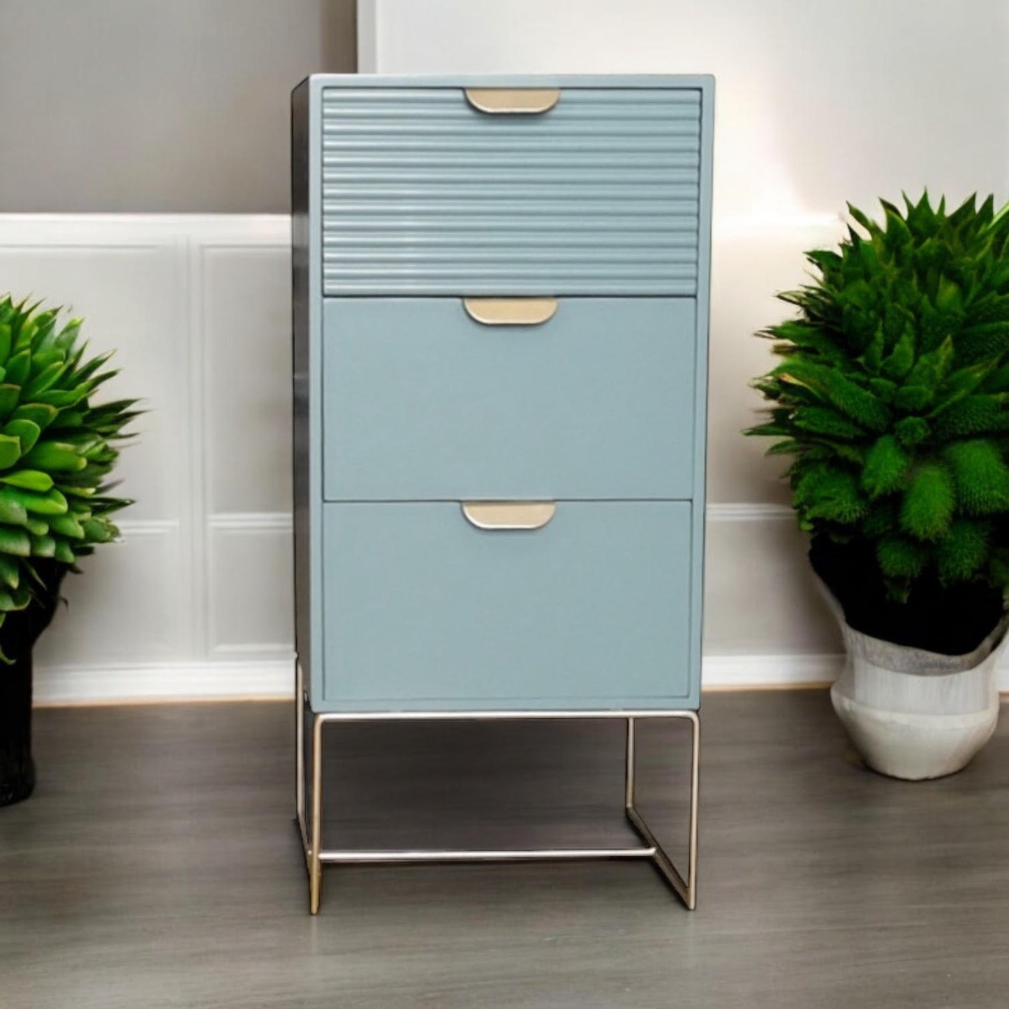 Green wooden bedside table with three drawers and scalloped edges, compact storage unit by MSL.