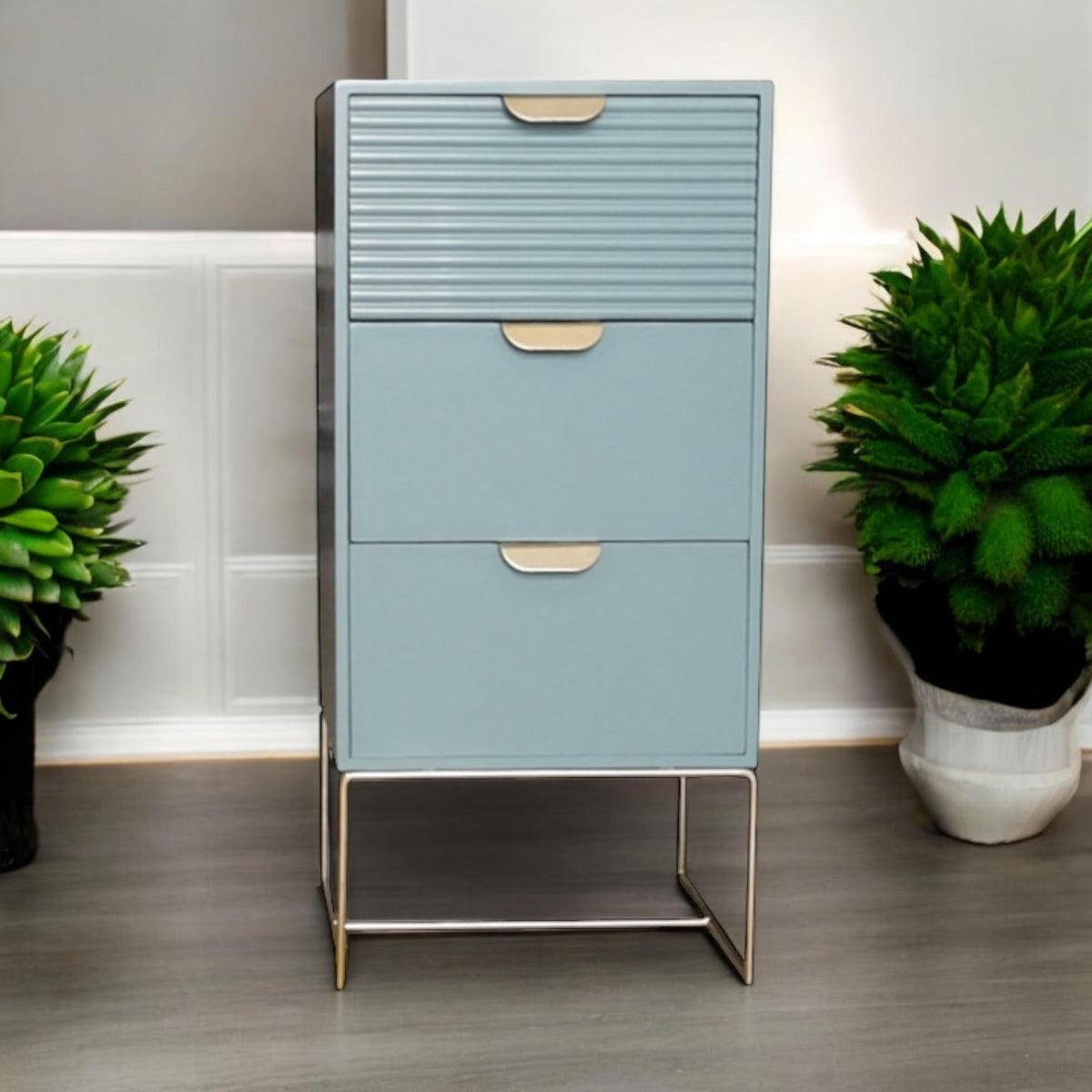 Green wooden bedside table with three drawers and scalloped edges, compact storage unit by MSL.