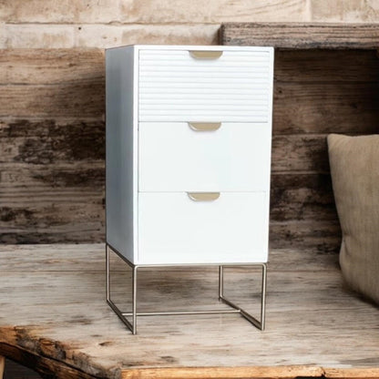 White wooden bedside table with three drawers and scalloped edges, compact storage unit by MSL.