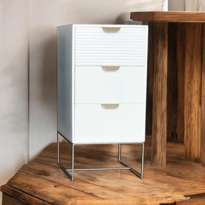 White wooden bedside table with 3 drawers and scalloped edges, compact storage unit by MSL, ideal for bedroom organization.