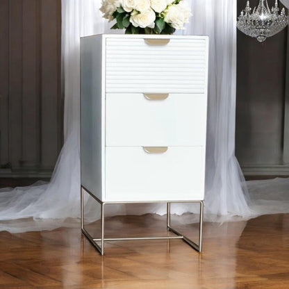 White wooden bedside table with three drawers and scalloped edges, compact storage unit by MSL.