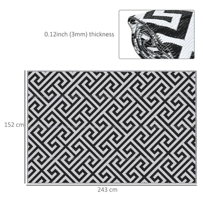 Reversible outdoor rug in black, 152x243cm, portable plastic straw camping and garden mat for outdoor use.