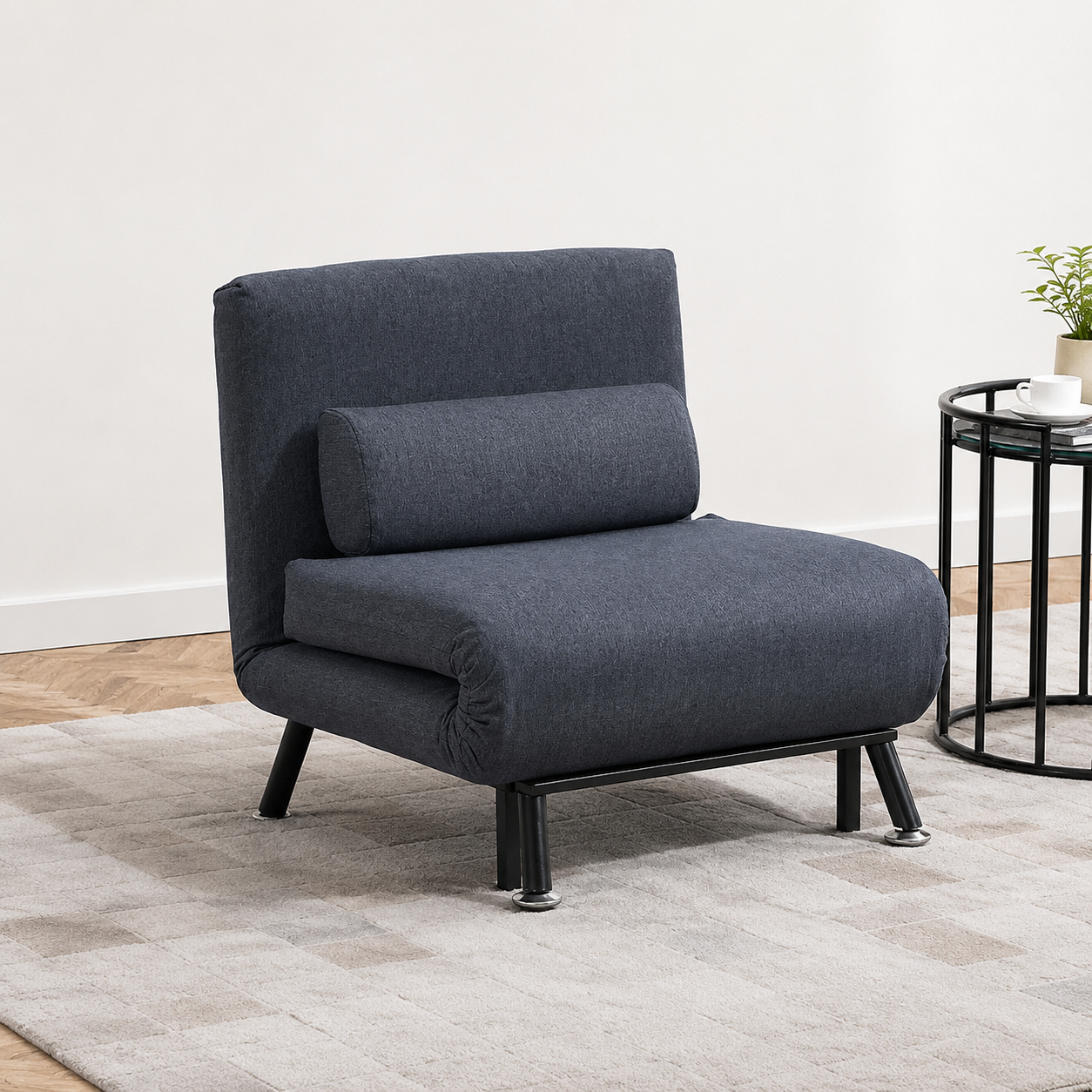 Comfortable sofa chair that functions as a single sofa bed, featuring a modern design with plush upholstery and supportive cushions.