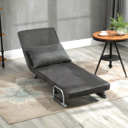 Foldable dark grey sofa bed and portable armchair with pillow, ideal for lounging and sleeping.