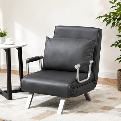 Foldable dark grey sofa bed and portable armchair with pillow, ideal for lounging and sleeping, unbranded.