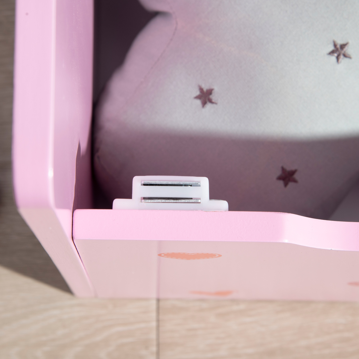 Pink wooden toy box and kids storage bench with safety rod, two-in-one design, ideal for children’s playroom organization.