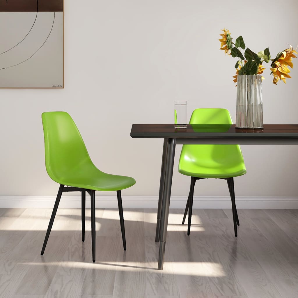 Two white PP dining chairs from vidaXL, modern design with sleek frames, suitable for dining rooms or kitchens.