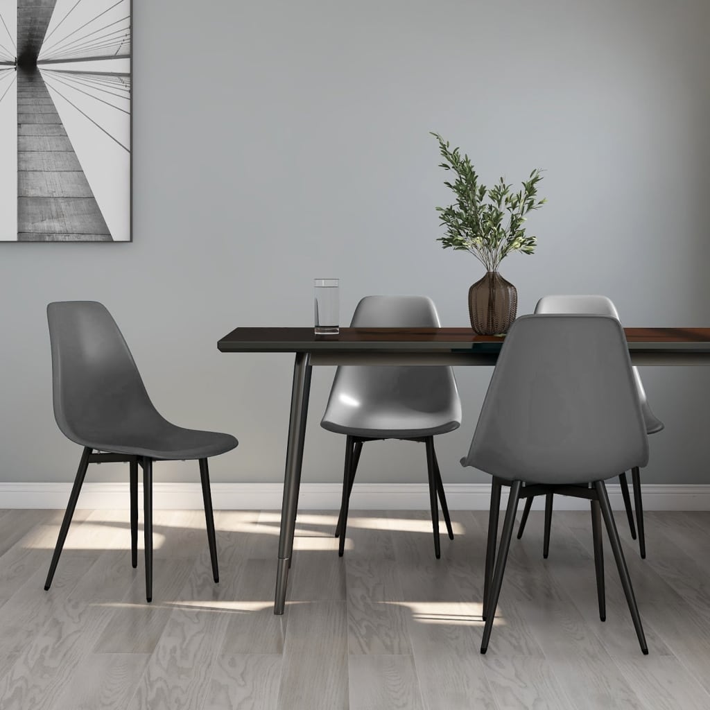 Set of two white polypropylene dining chairs by vidaXL with modern design, perfect for contemporary dining rooms.