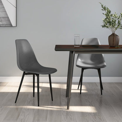 Pair of white PP dining chairs by vidaXL, modern design, with smooth seats and sturdy legs, ideal for kitchen or dining room.