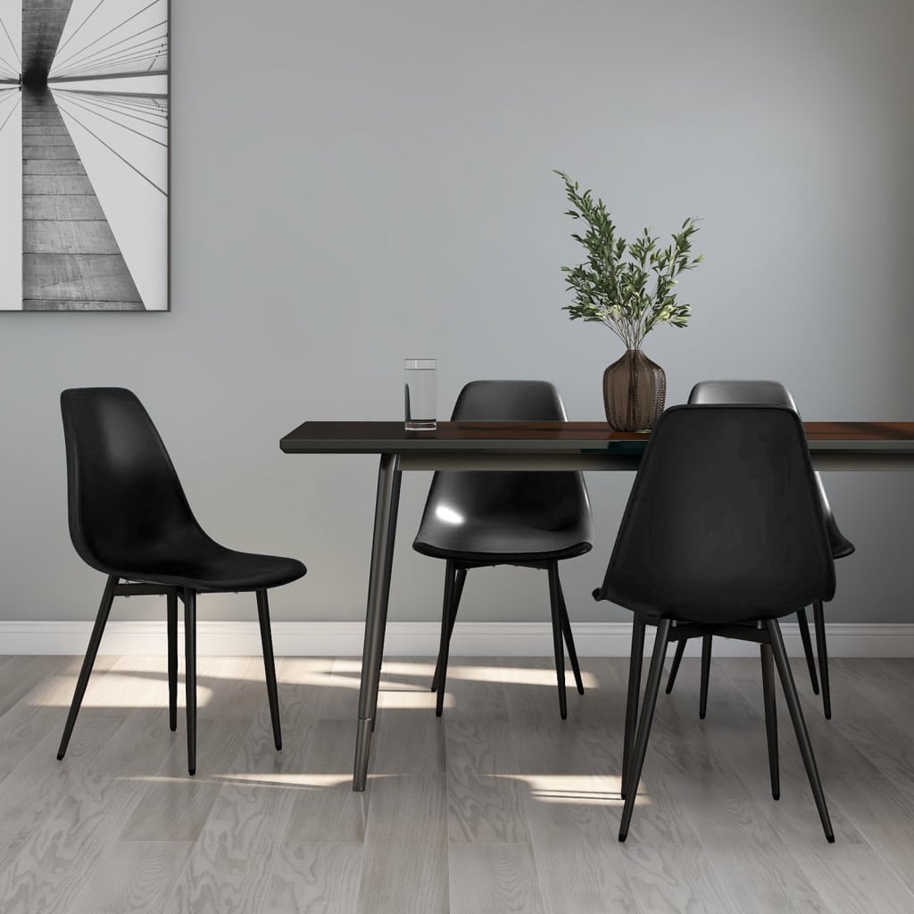 Set of two white plastic dining chairs by vidaXL with sleek, modern design and sturdy PP material for comfortable seating.