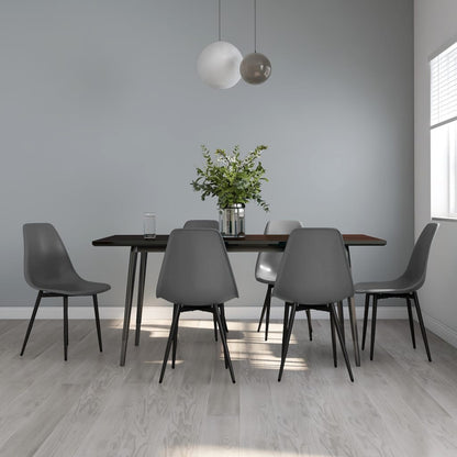 Two white vidaXL dining chairs made of durable polypropylene, featuring a modern design perfect for kitchen or dining room.