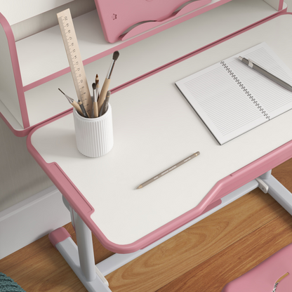 Pink height adjustable kids desk and chair set with drawer and bookshelf by ZONEKIZ, suitable for children’s study space.